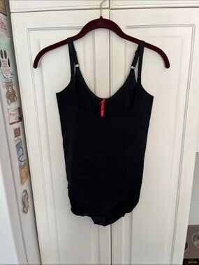 Spanx Black Body Suit
Size Large 
Black